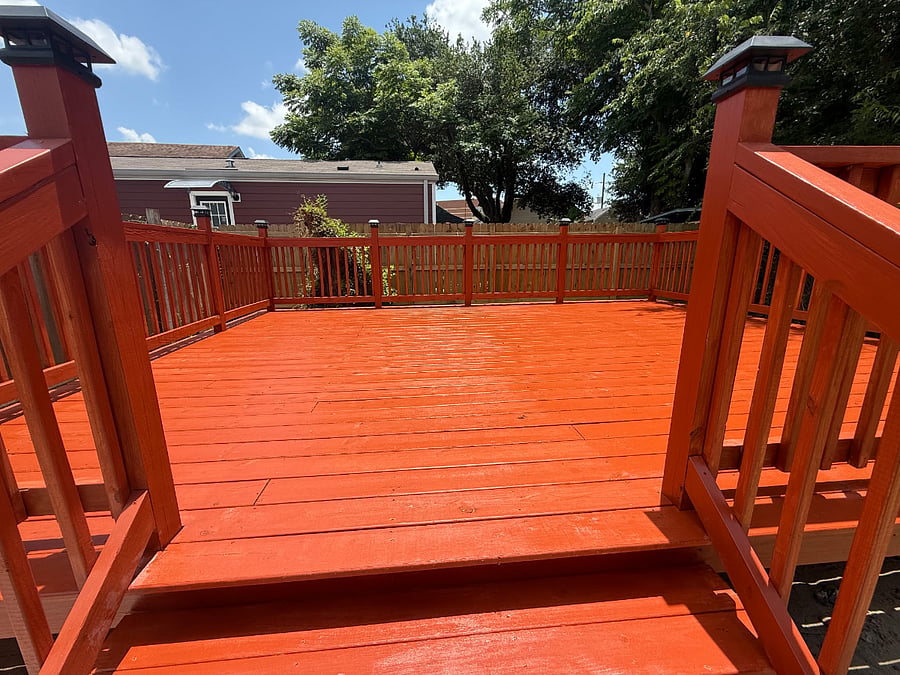 Huge deck in backyard.