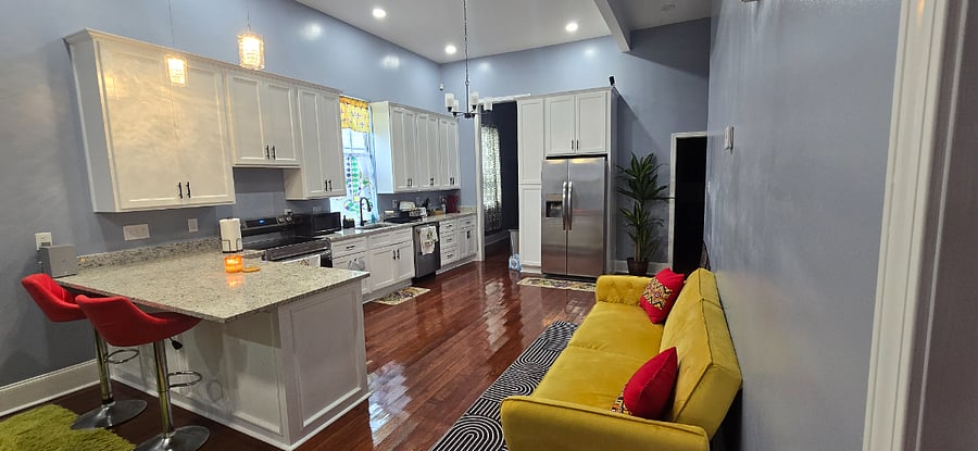 Brand new kitchen with new appliances: refrigerator, stove and dishwasher. 