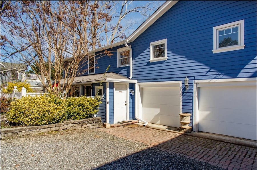 View of front door and full cottage. The Hideaway is located above the two car garage (not a garage, just storage and my office)