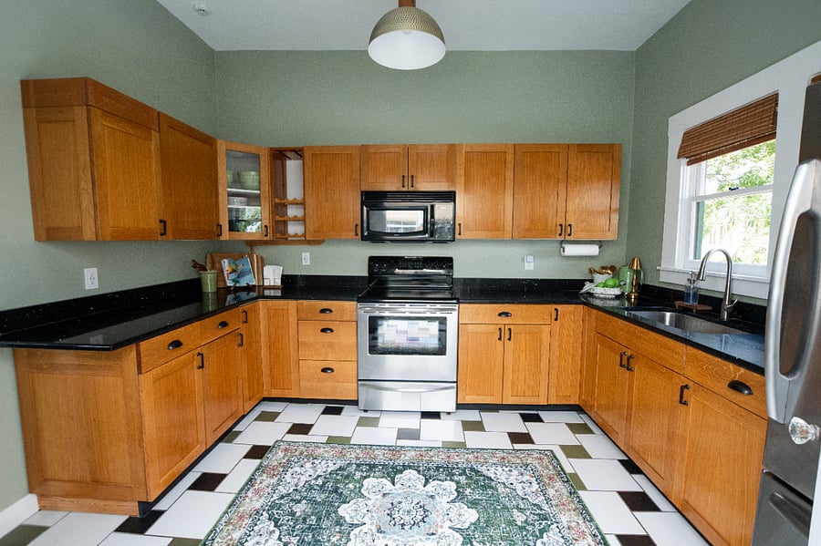 Full size fridge, stove, microwave, and all small appliances.