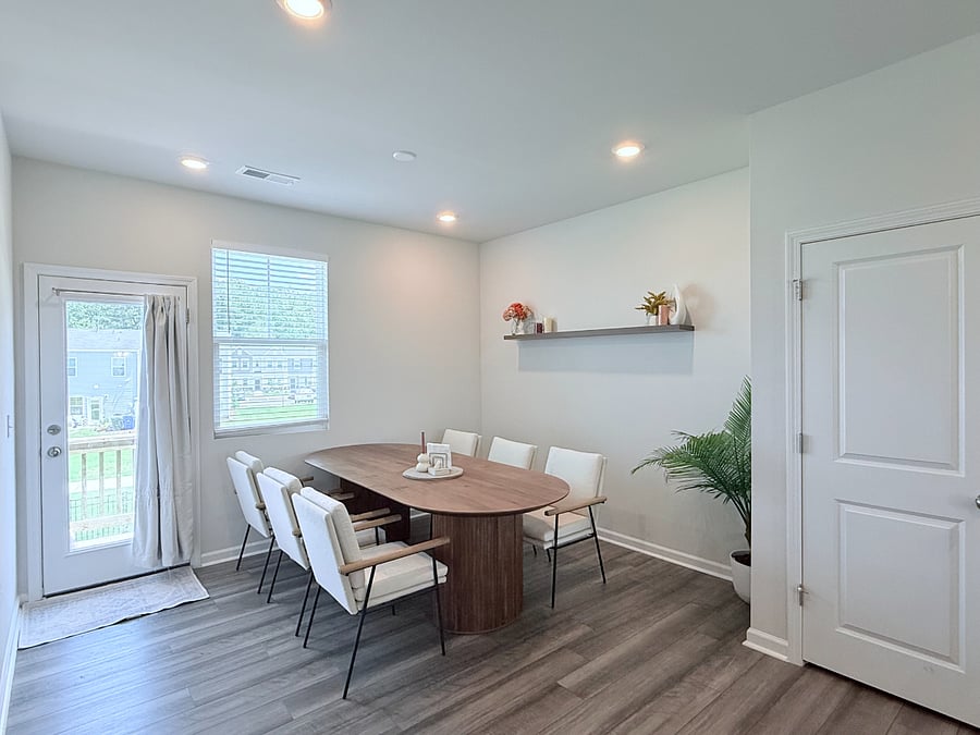 Second floor: Dining room, balcony door, and kitchen pantry