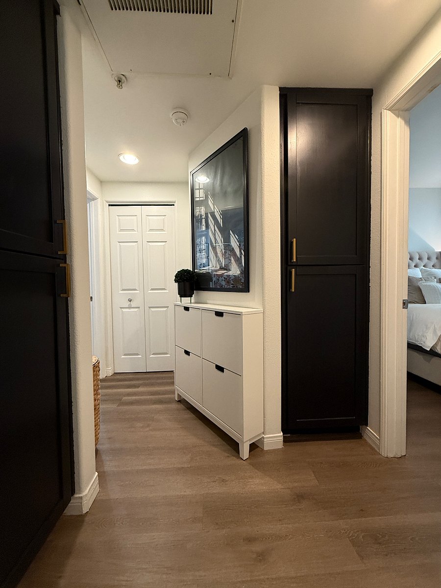 Hallway with cubby to hide shoes. 