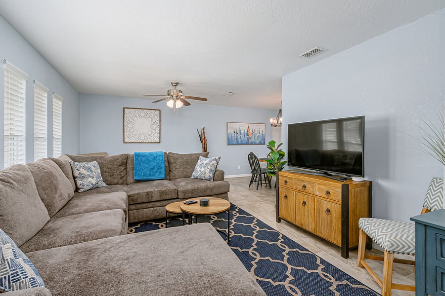 Living Room with Roku TV and Queen Pull-Out Couch