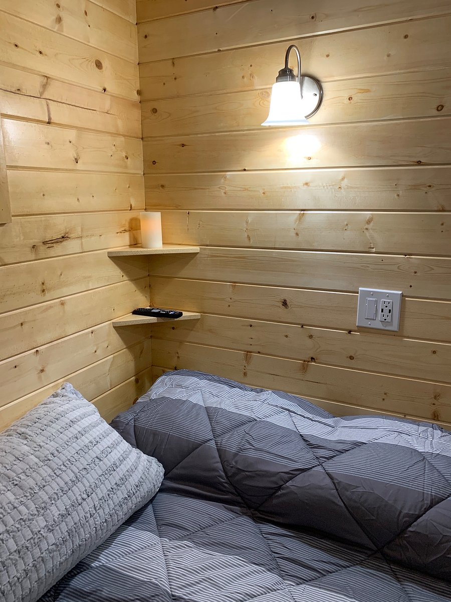 Built-in shelves for candles, phones, remote, etc
