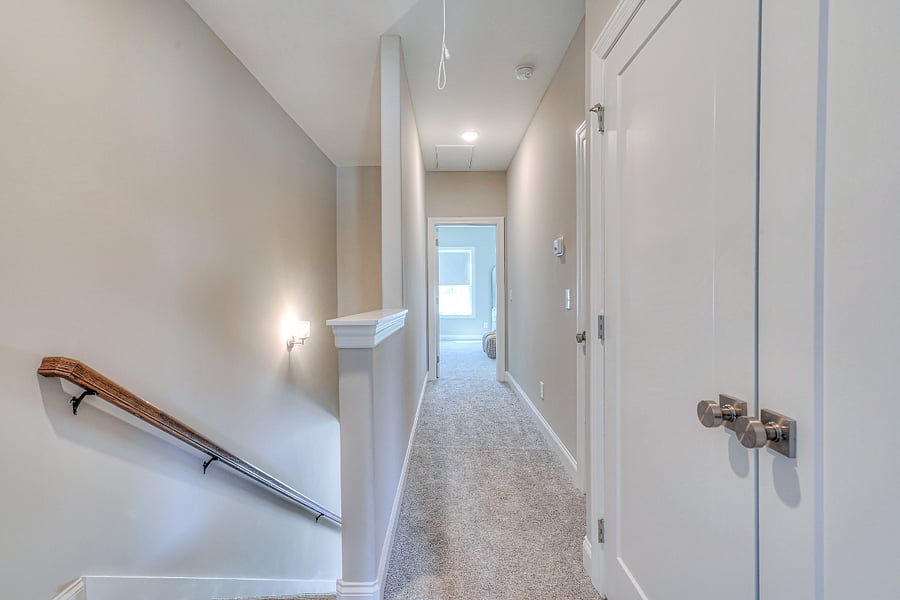 washer and dryer are located in this upstairs hallway