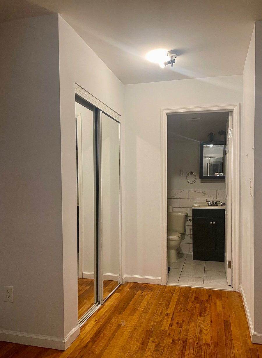 Private bathroom inside larger room