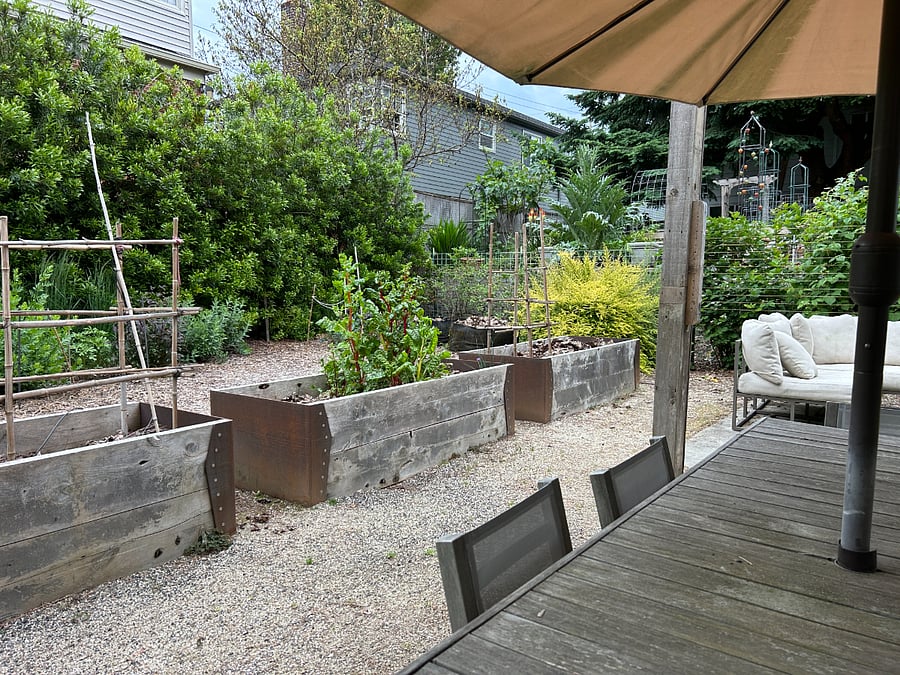 Situated for outdoor dining and relaxation with pollinator loving perennials