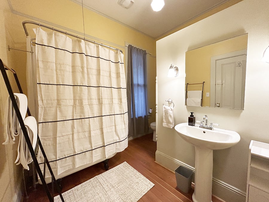 Large bath with a cast iron tub
