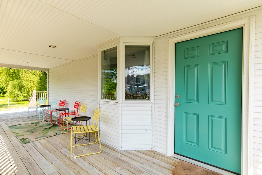 The covered porch and side entrance area.