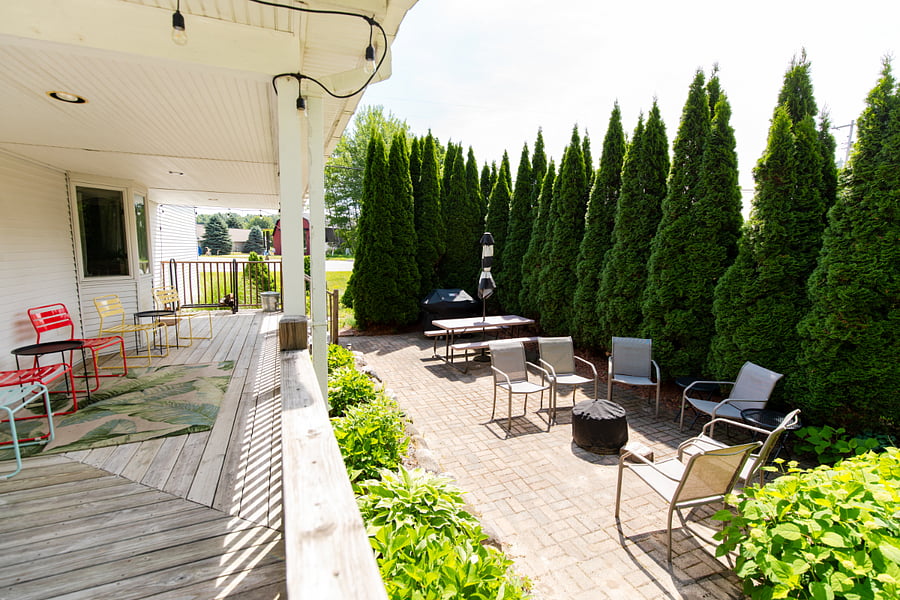 The covered porch and patio area.