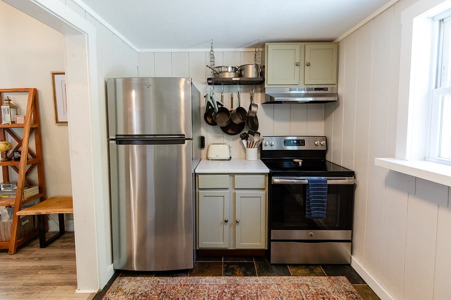 Viewing the oven/stove and refrigerator/freezer.
