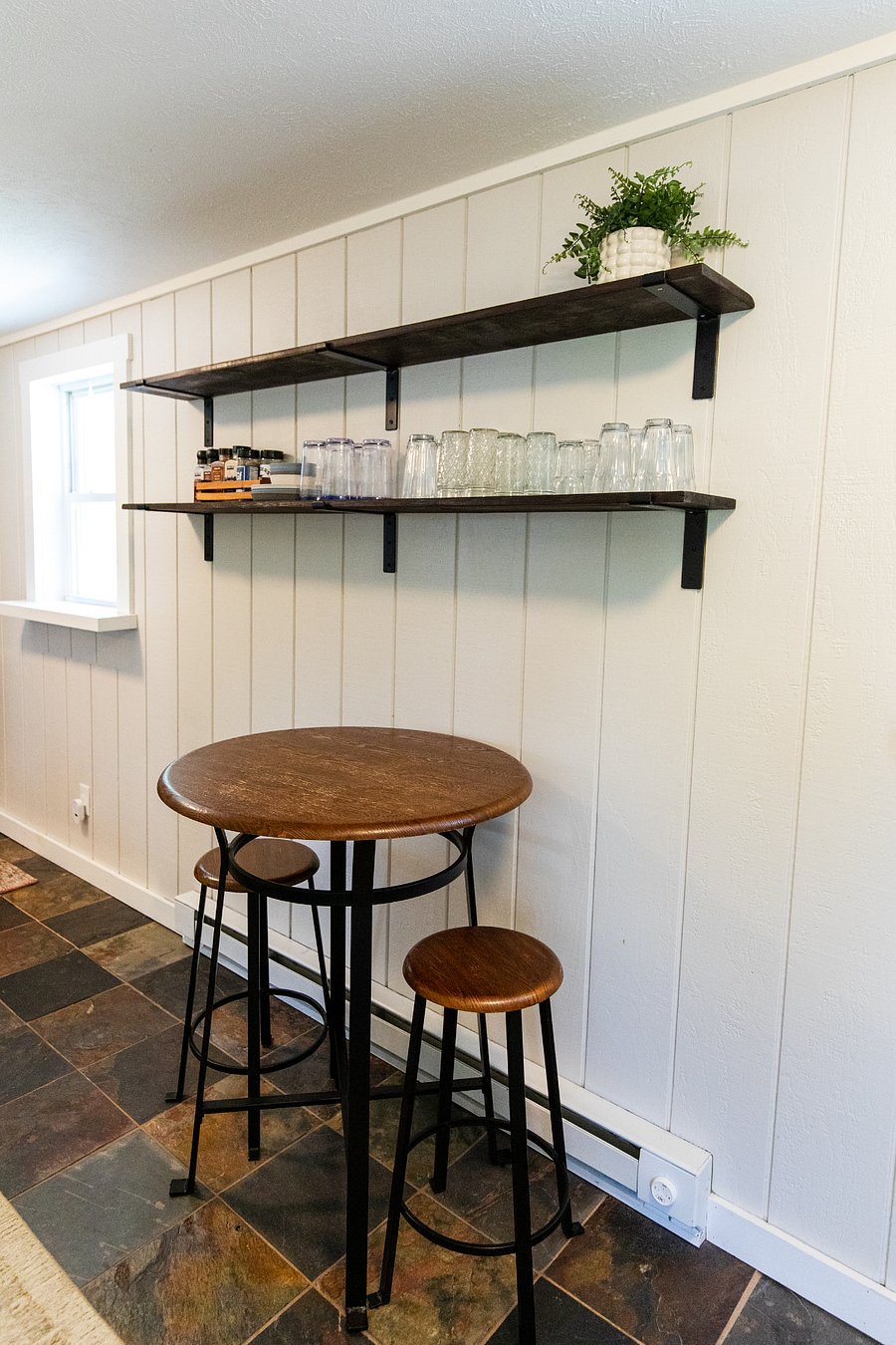 A bistro set in the kitchen for two.
