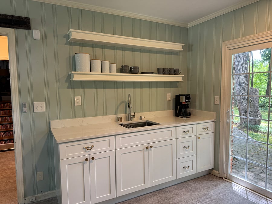 Sink with cabinets and open shelves