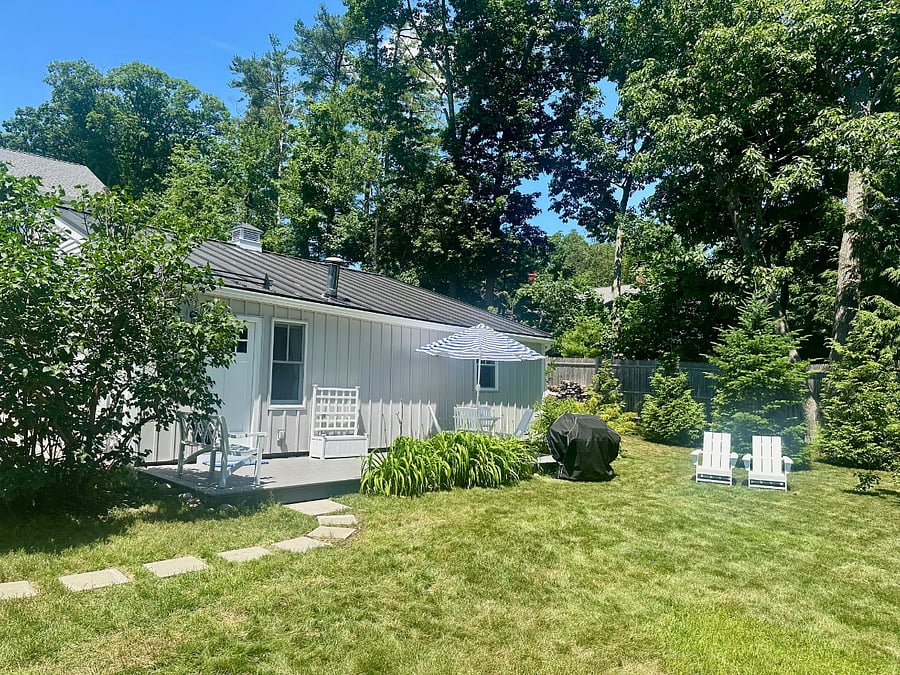 Large and private side deck with propane grill. Expansive lawn. Great for morning coffee or outdoor dining.