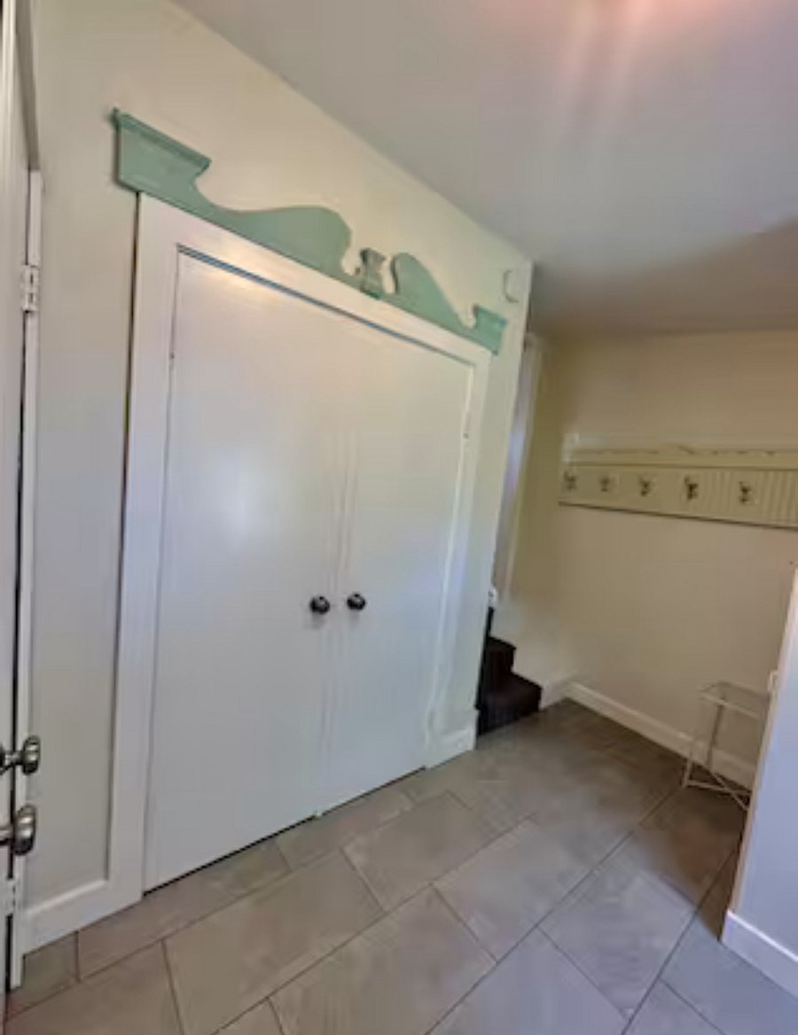 Spacious mudroom entry with plenty of storage