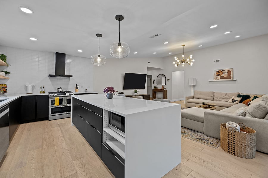 Create culinary delights in this open concept living/dining/kitchen room with gas stove