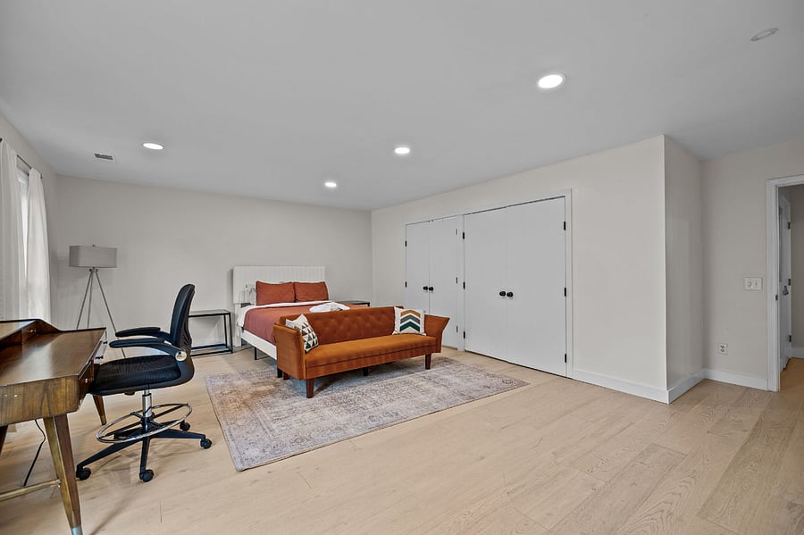 This spacious queen bedroom has now been updated with new closet and workstation
