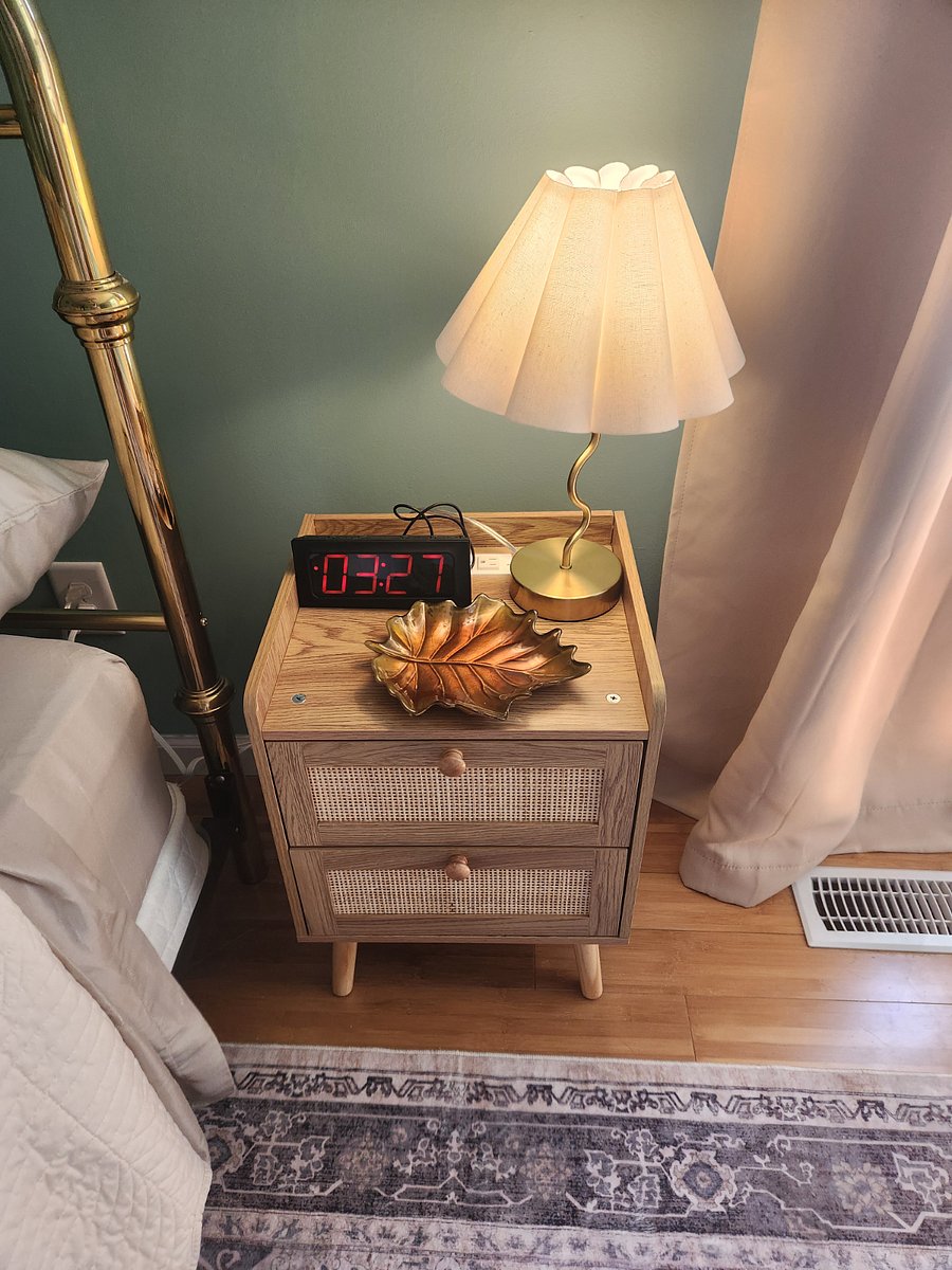 Provided alarm clock, a dimmable lamp and plenty of storage in the nightstand