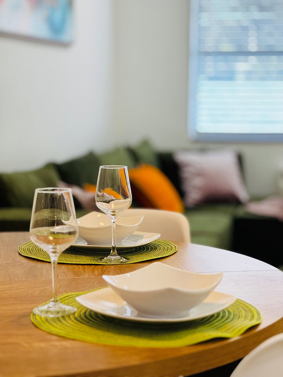 The spacious dining area comfortably seats everyone, making it ideal for shared meals, game nights, or gathering with friends and family.