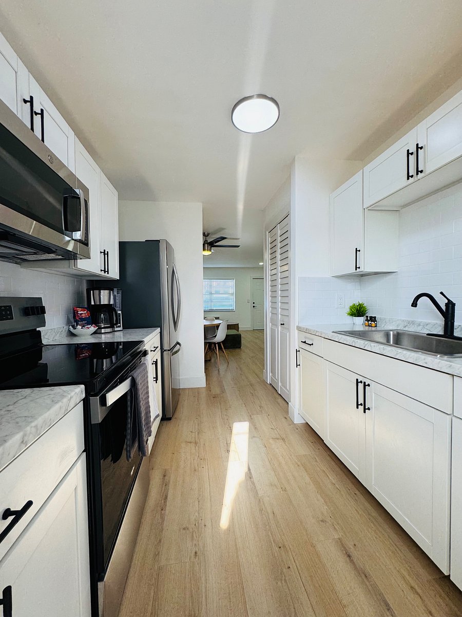 The kitchen is top-of-the-line, fully equipped with modern appliances and sleek finishes - perfect for preparing meals with ease and style.