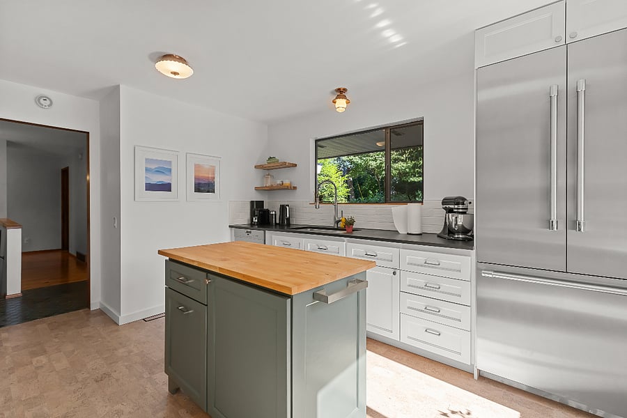 kitchen well-stocked with everything you need including cookware and small-appliances
