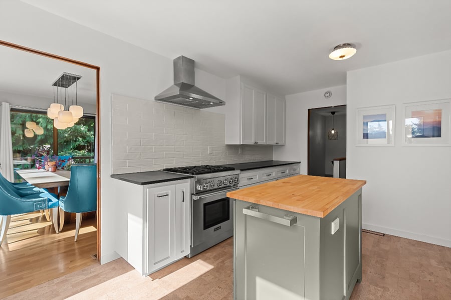 kitchen open to dining room and entryway and these pocket doors can also be closed