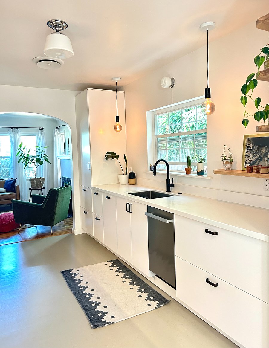 New kitchen with quartz countertops and modern appliances.