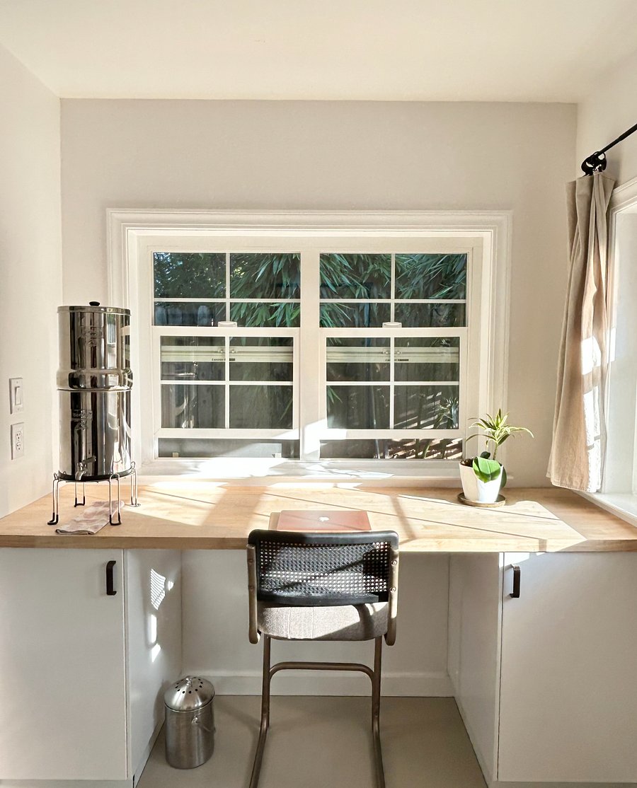 Cozy kitchen nook for work and quick bites.