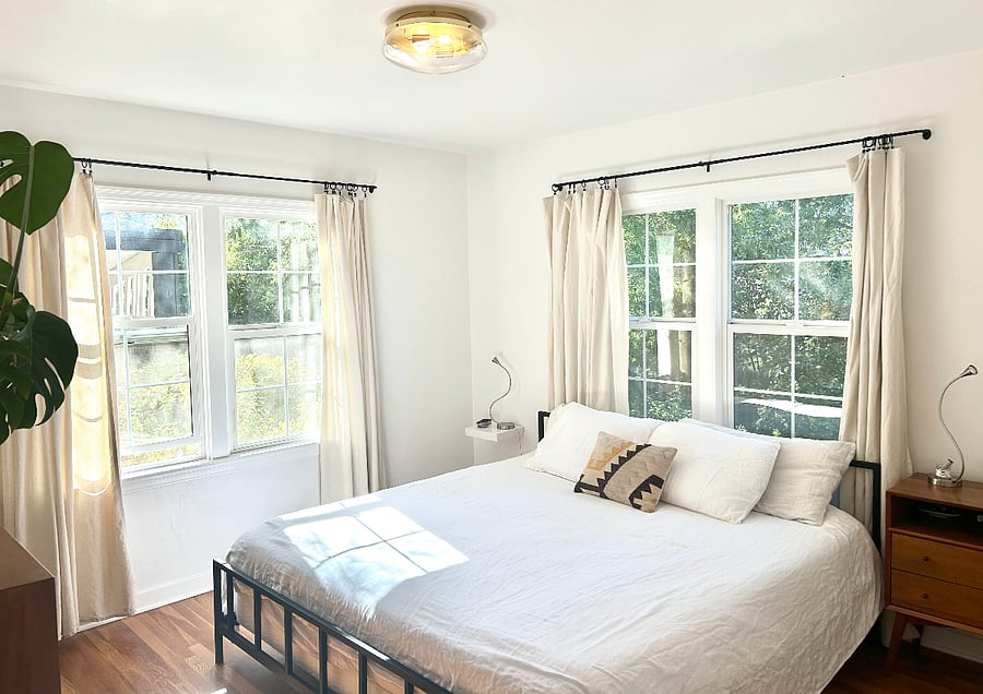 King-size Tuft & Needle bed, West Elm furniture, air purifying salt lamp, reading lights, walk-in closet.