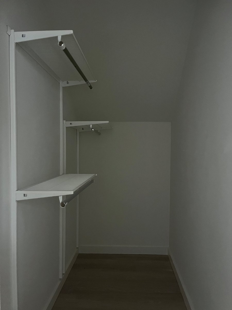 Bedroom 1: view of the walk in closet