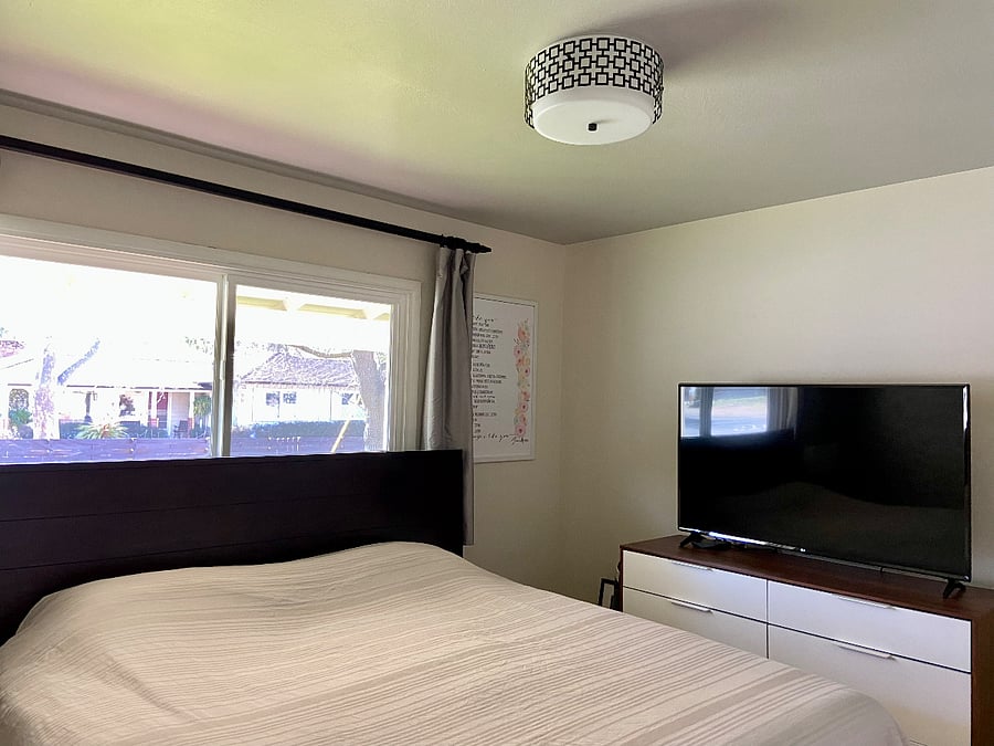 We have actually upgraded the TV and mounted the new TV on the wall, and the bed faces the TV now.