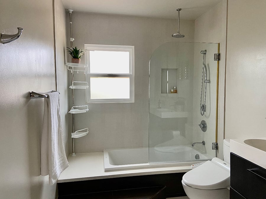 Your bathroom with shower, tub, and Japanese bidet toilet.