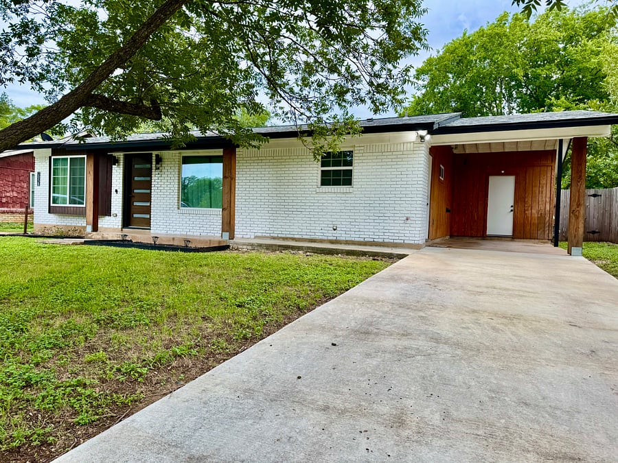 Long driveway and carport for up to 3 vehicles