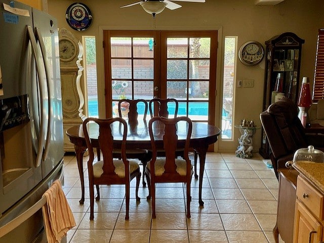 Kitchen Table and French Doors to Backyard Swimming Pool