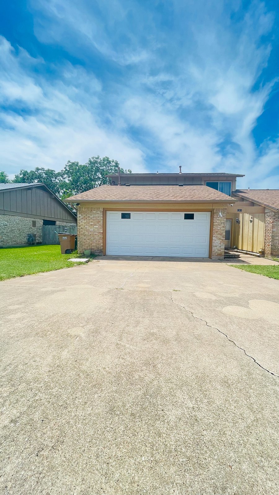 Front of home facing south , two car garage plus 4 car driveway