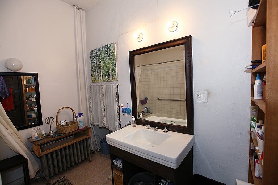 bathroom was recently tiled with porcelain floor tiles, (not pictured)