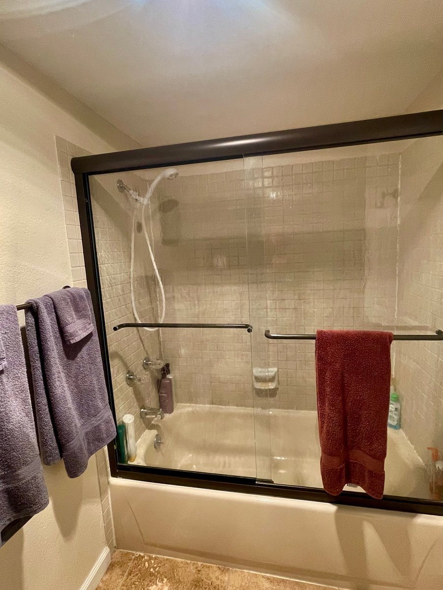 Full shower with bathtub