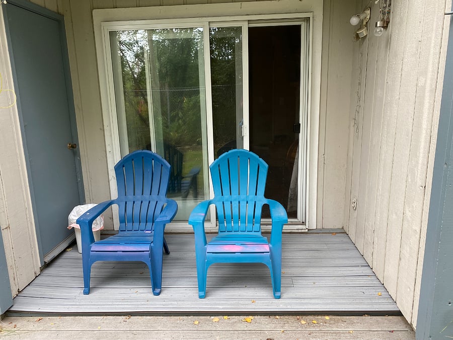 Chairs to relax on the back porch. Green belt in back yard and privacy.
