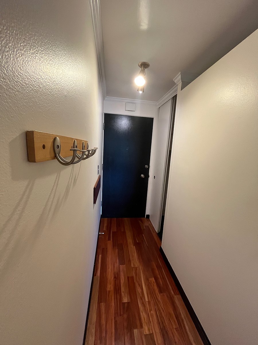 Inside the apartment, jackets have a home on the hallway hooks right when you step inside The Green Room door.