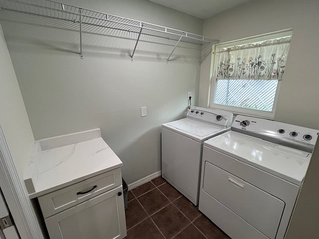 Inside Laundry Room with Washer and Dryer Included