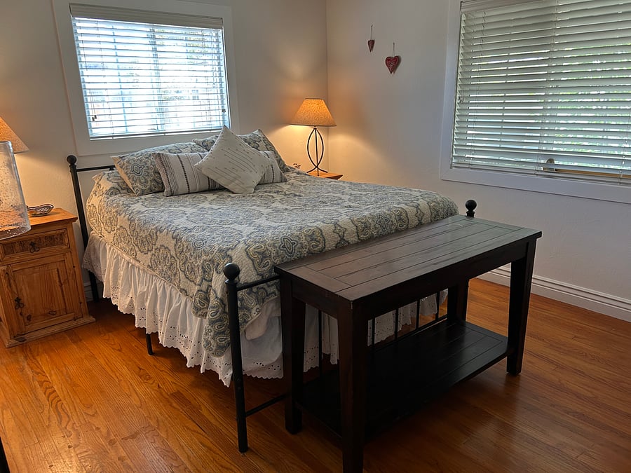 Bedroom 1 - queen bed, armoire, closet