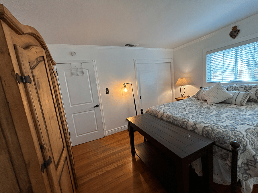 Bedroom 1 - queen bed, armoire, closet