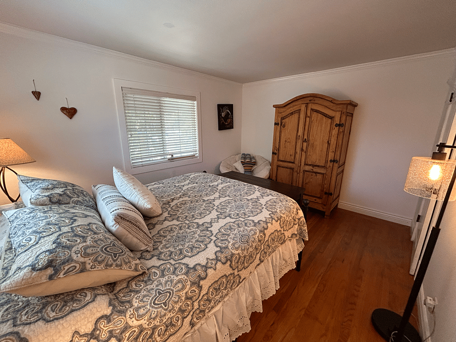 Bedroom 1 - queen bed, armoire, closet