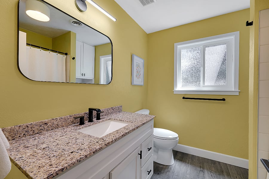 Additional bathroom, located near second bedroom and third bedroom/office