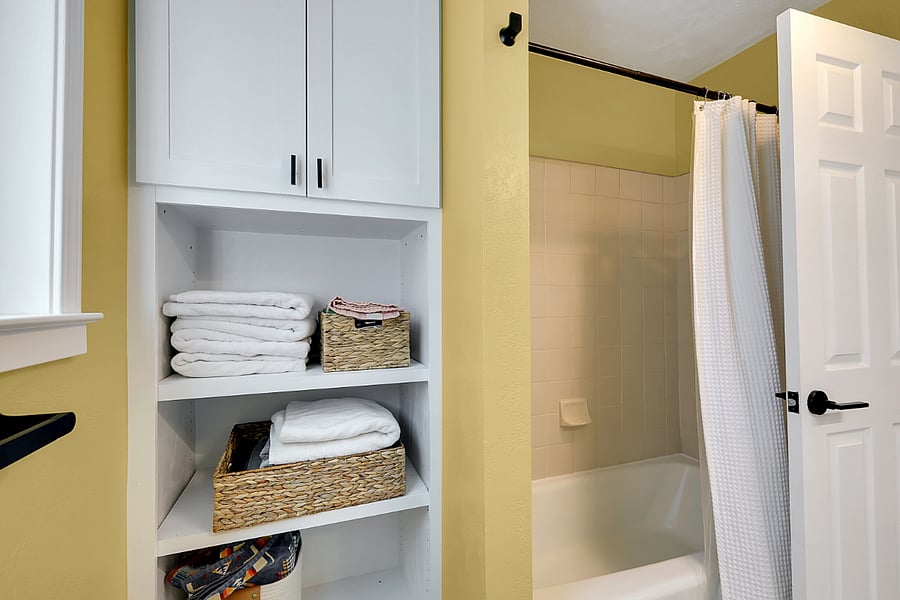 Additional bathroom, located near second bedroom and third bedroom/office