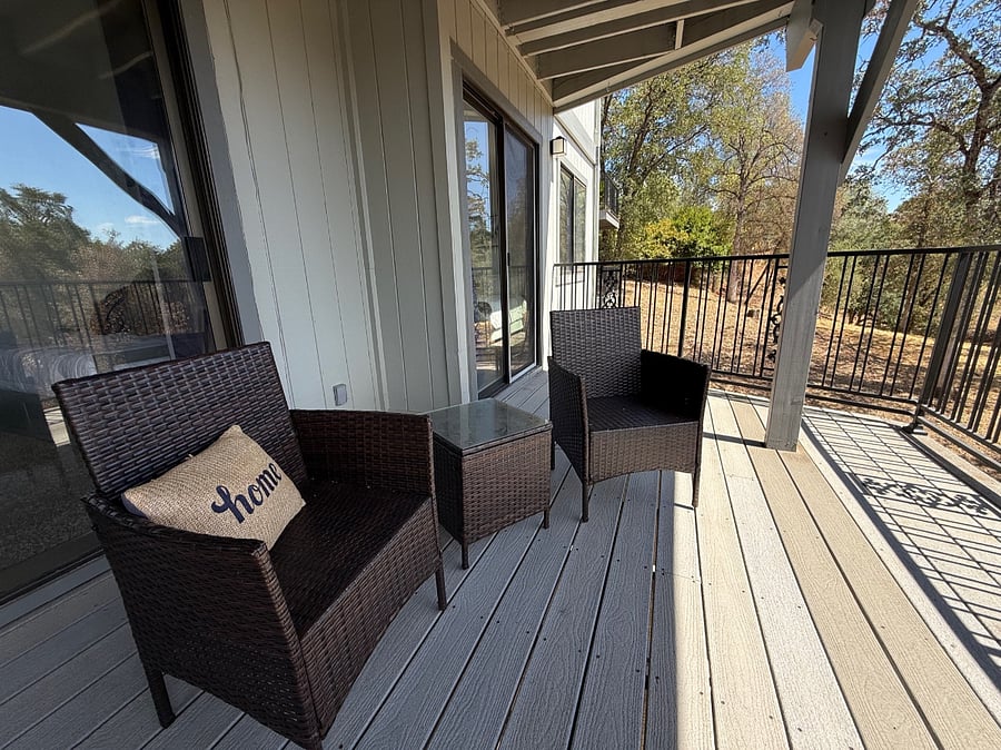 Middle Floor Balcony with Seating and Views of the greenbelt