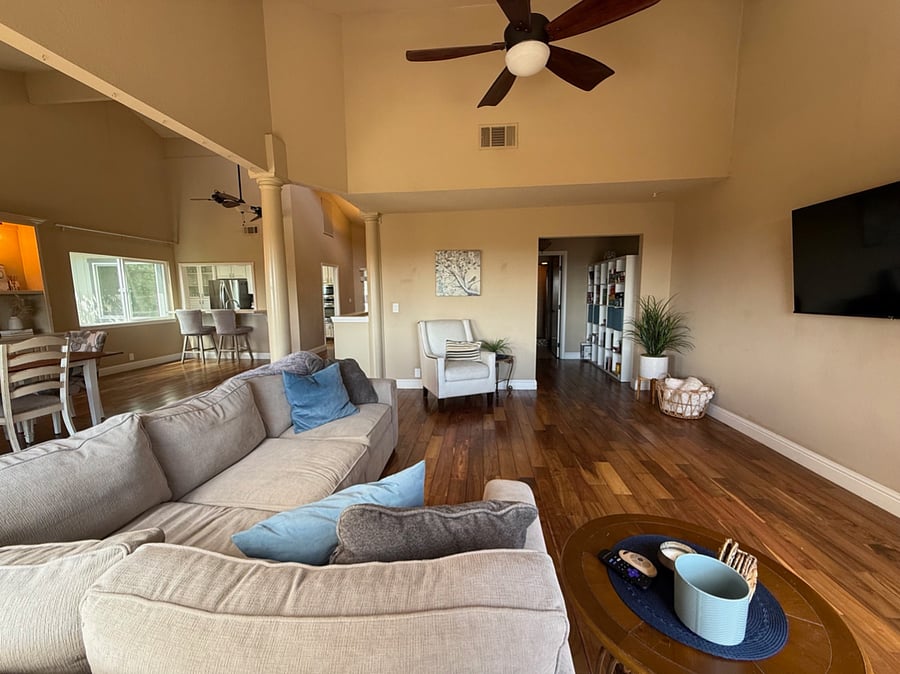 Living Room looking into top floor bathroom