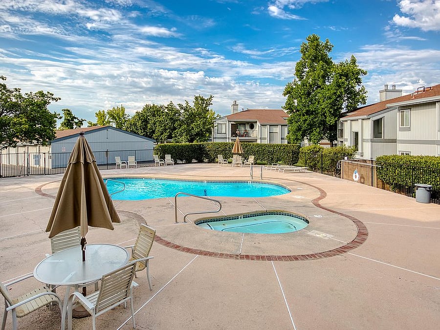 Community pool and hot tub just across the parking lot from the front door 