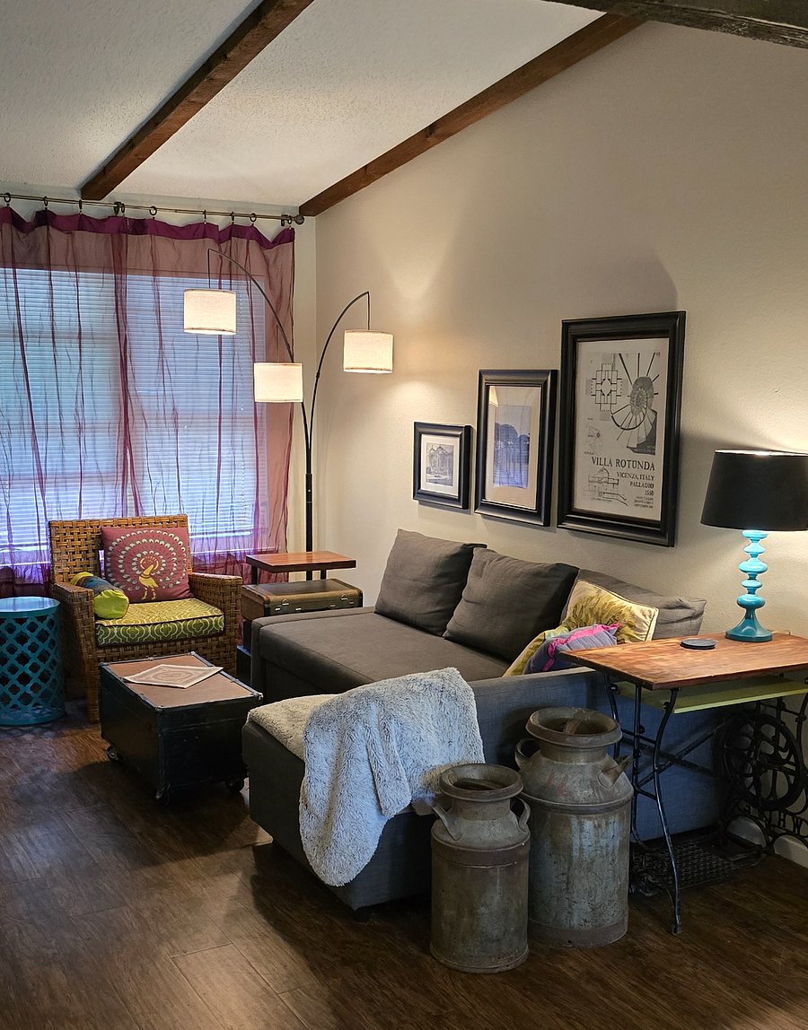 The living room comfortably seats 4 and has a TV with antenna, DVD player and blu-ray disc player. The sofa converts into a queen size bed if more sleeping spaces are needed.