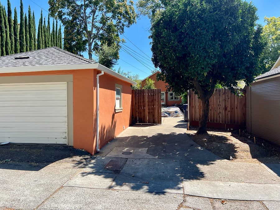 Detached garage and dedicated parking space monitored by security cameras. Detached garage also features a washer/dryer and ample storage.
